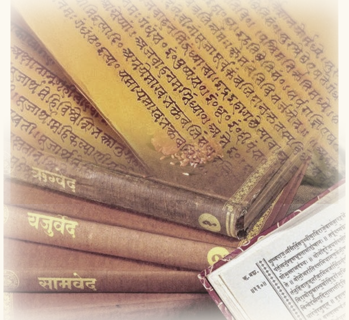 Palm-leaf manuscript text blended with bound volumes of the four Vedas